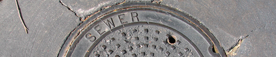 Smelly Manhole Cover Before Manhole Odor Eliminator